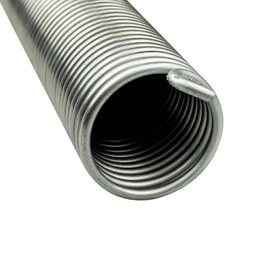 Gebrochene Hörmann ressort de torsion am porte de garage avec Vergleich entre Originalfeder avec Spannkonus et kompatibler Ersatzfeder.